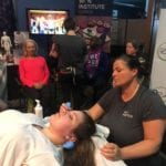 a woman is getting a massage at the Won Institute clinics