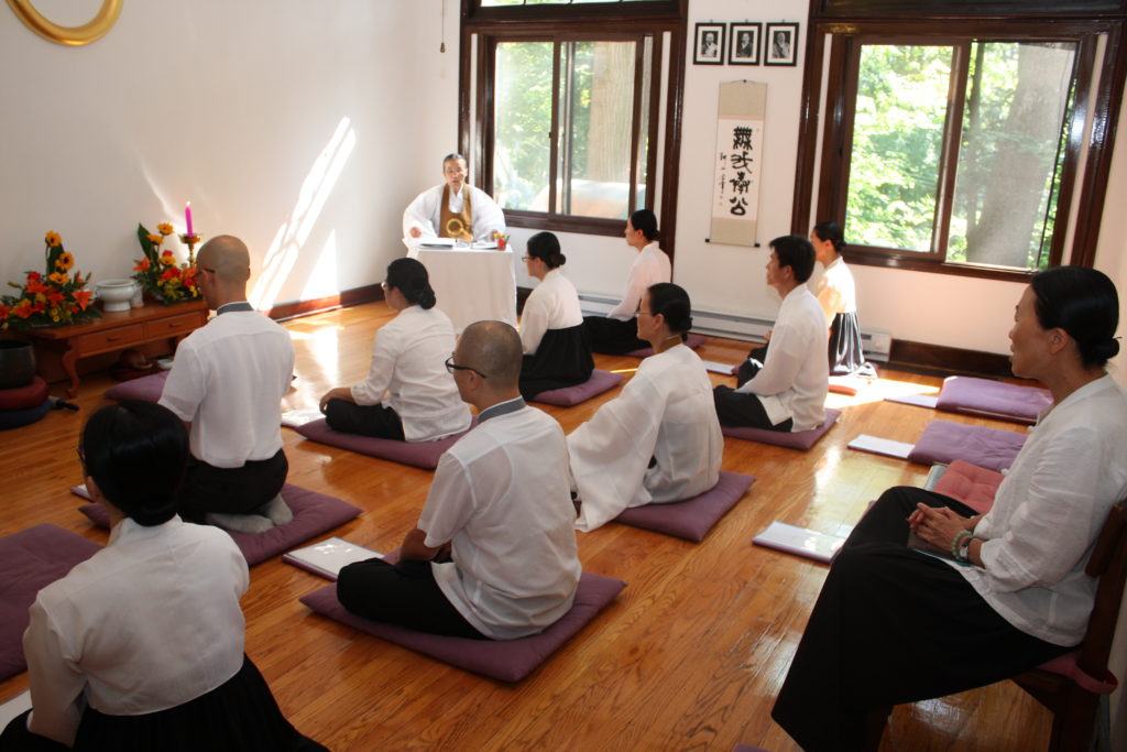 Won Buddhist ministers doing sitting meditation.